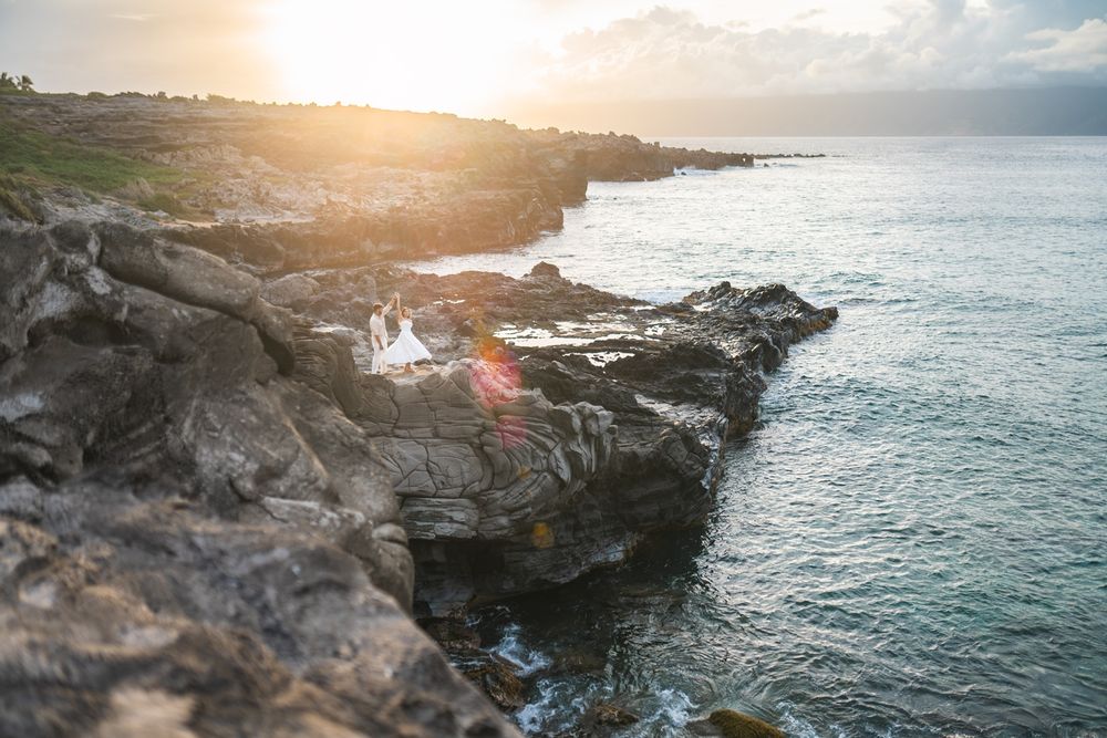 Proposal engagement couple photo shoot during sunset beach with cliff on Maui Hawaii by ohwowfotos