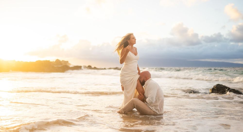 Wedding couple photo shoot during sunset beach on Maui Hawaii by ohwowfotos
