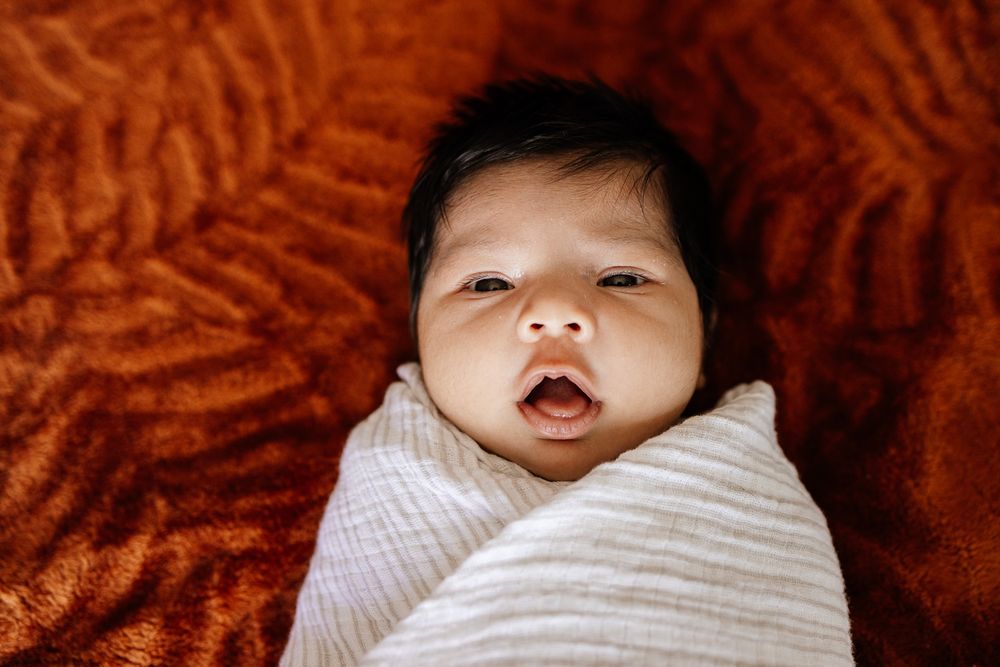 Close-up of a swaddled baby, photographed by Cindy Tucey Photography during a Bay Area session in San Jose