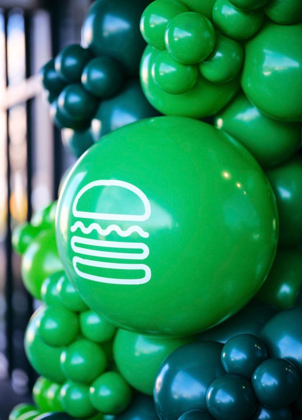 Corporate event photography of Shake Shack grand opening ribbon cutting ceremony in Pikesville, Maryland.