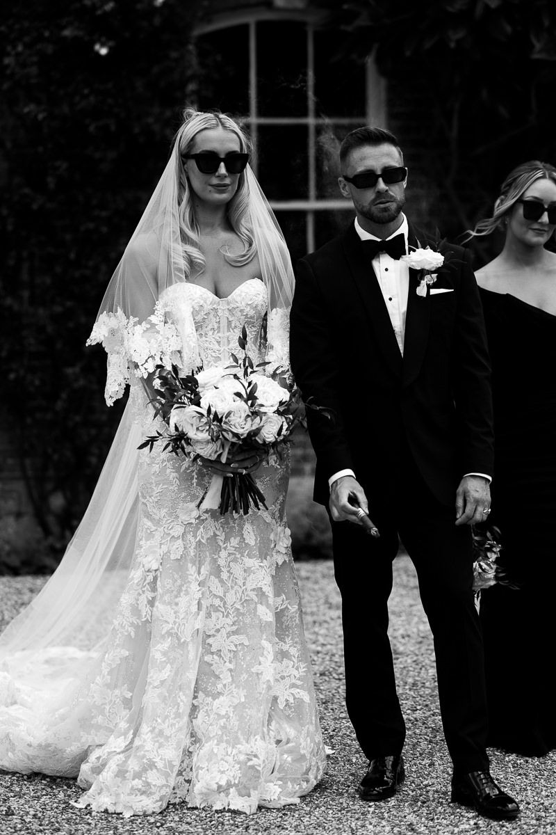 Stylish wedding couple cotswolds black and white