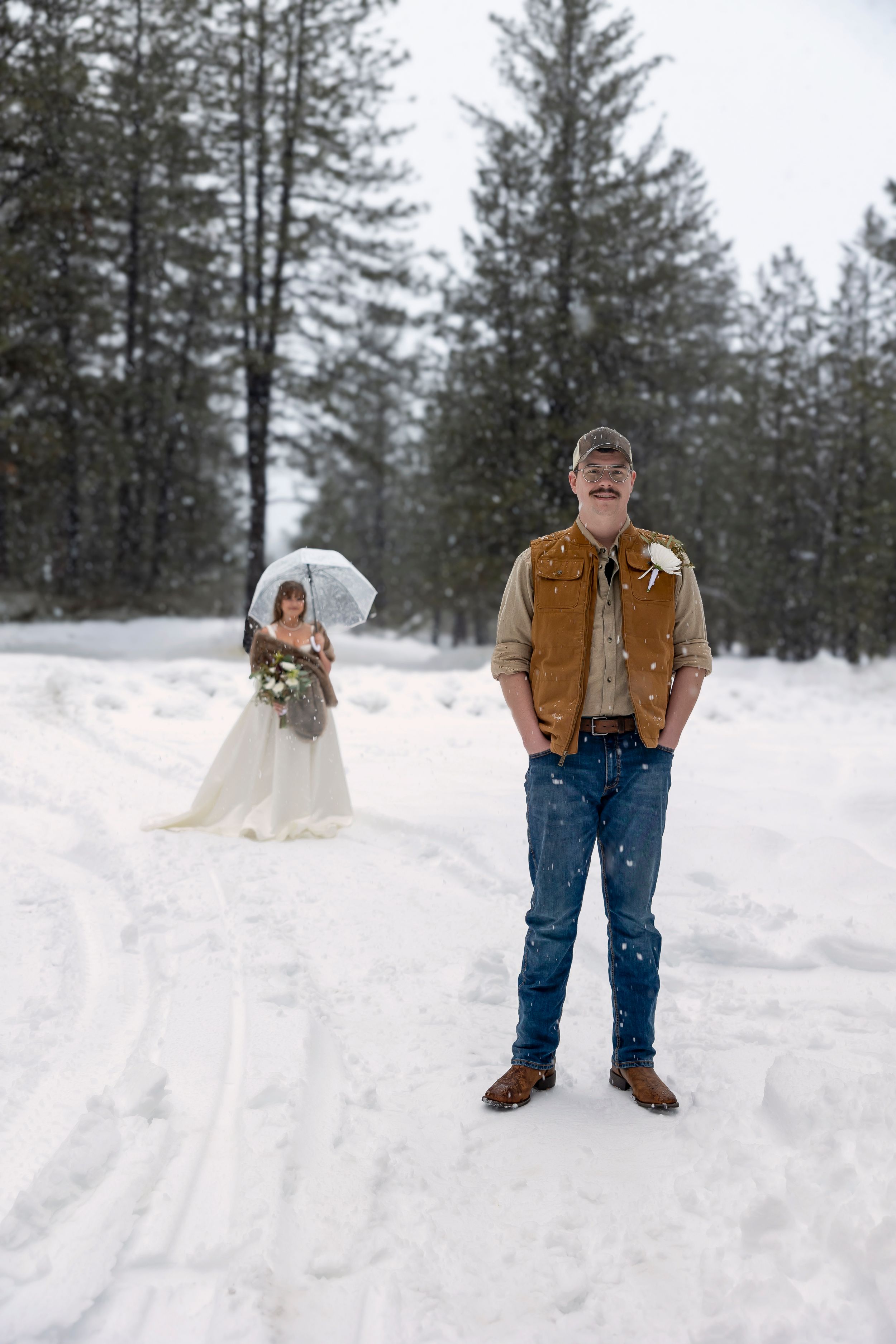 snowy winter elopement in Idaho City first look