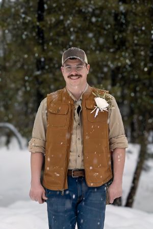 snowy winter elopement in Idaho City groom