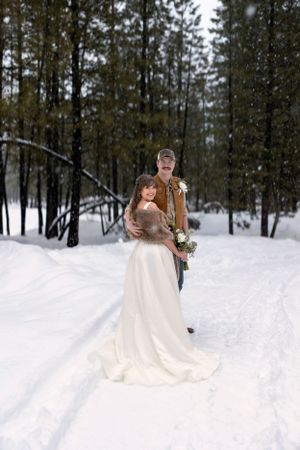 snowy winter elopement in Idaho City couple's portrait