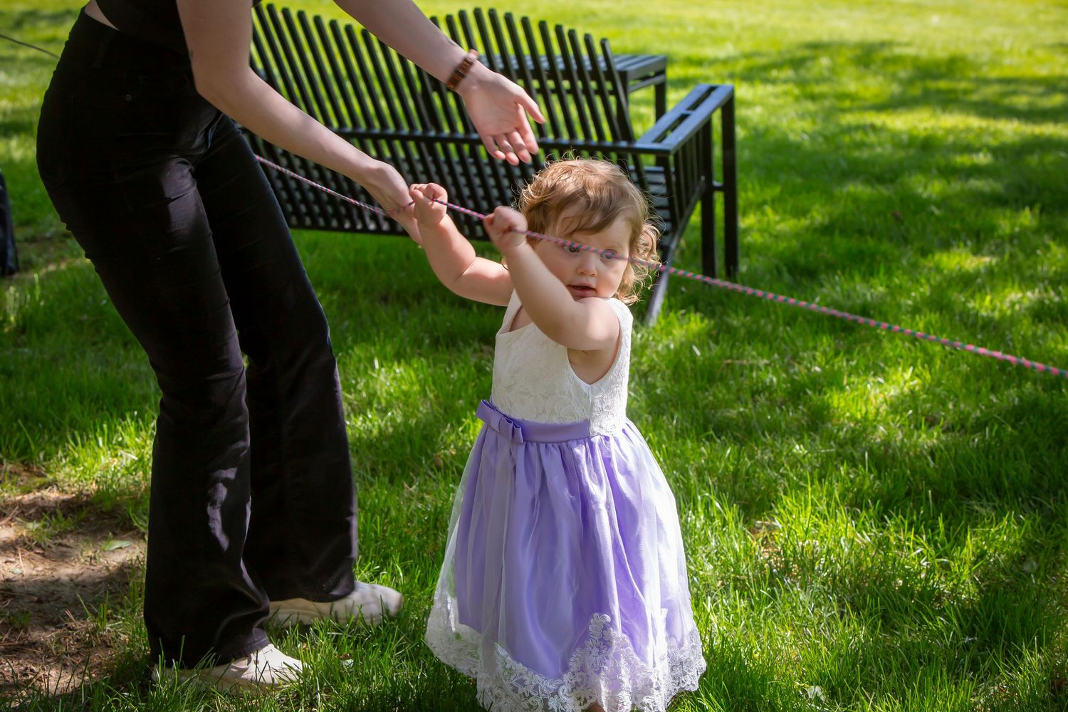 stylist doubling as childcare helping toddler