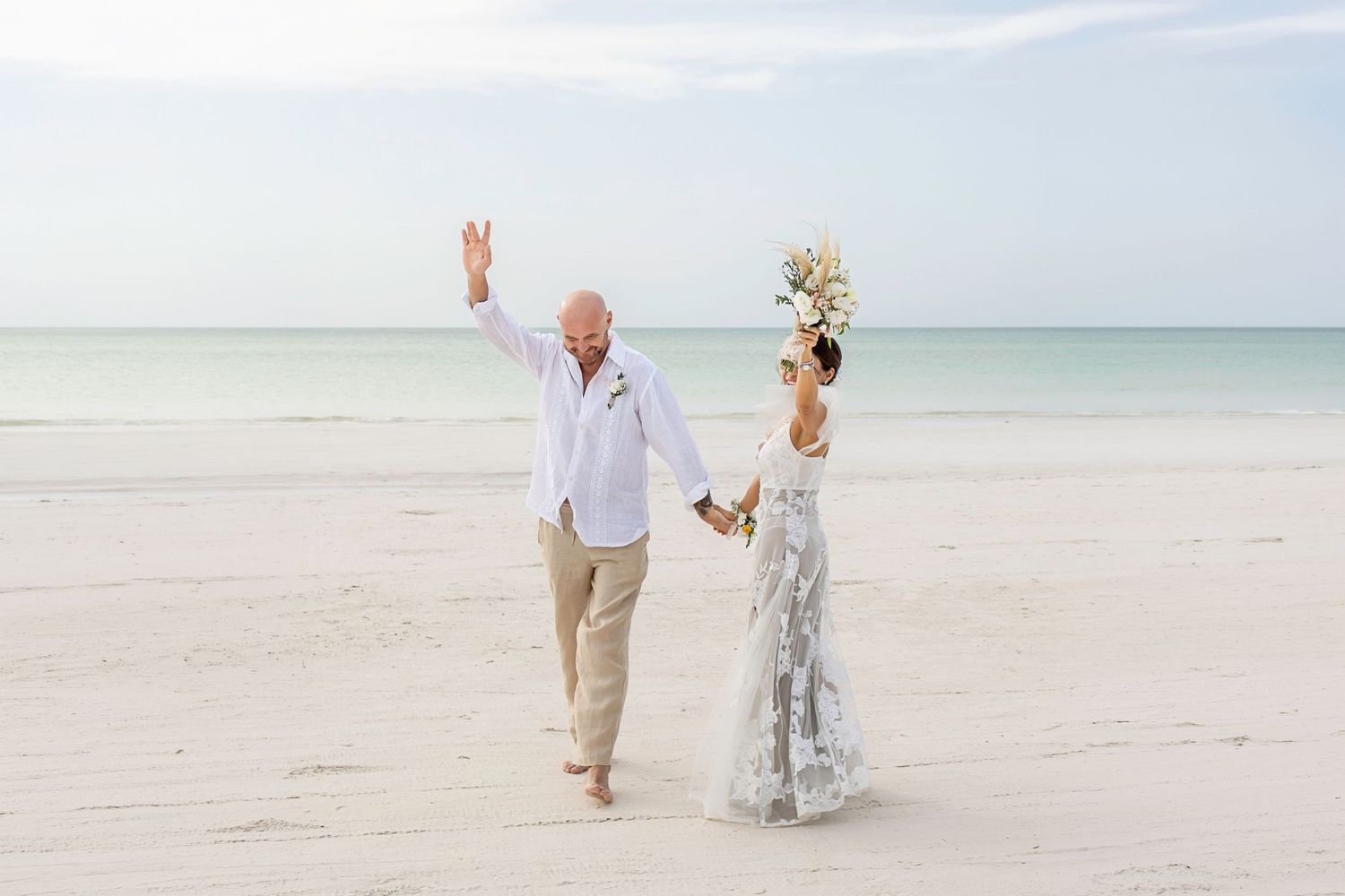 Laura and Jorge Posada enjoy a romantic walk at sunset in Rosewood Mayakoba during their 25th anniversary.