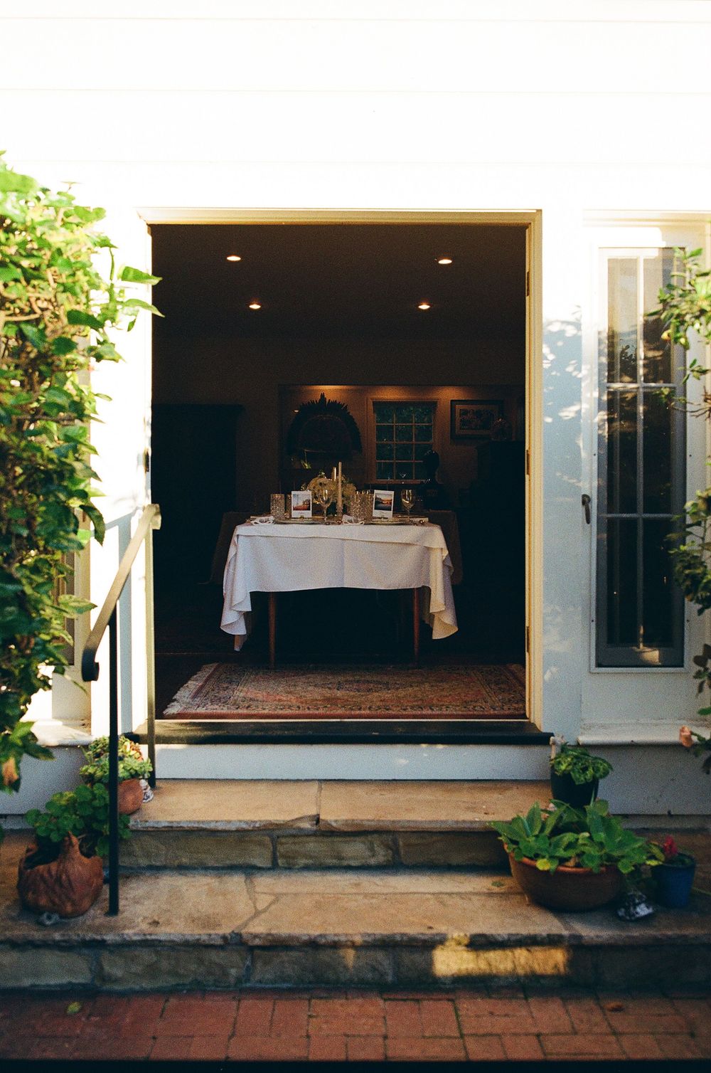 Intimate Hope Ranch backyard reception table. Documentary style by a California and Concord NC wedding photographer.