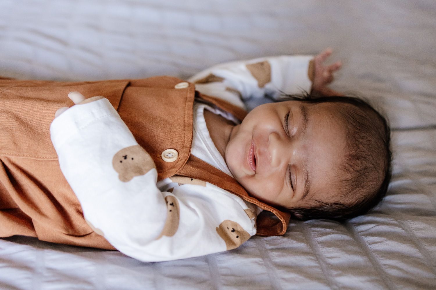 Baby sleeps during his newborn baby pictures