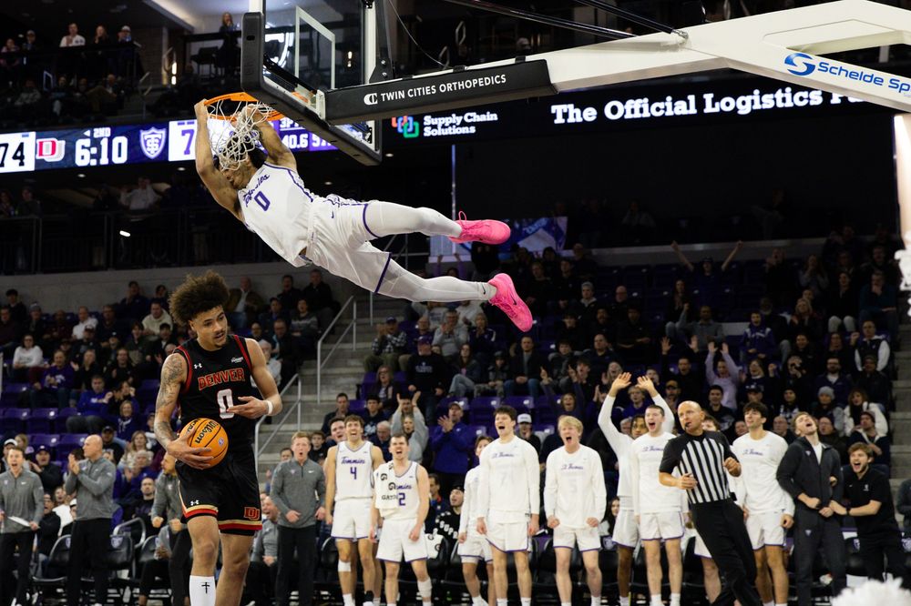 A montage of basketball game action shots showing players jumping and playing on the court during a match.