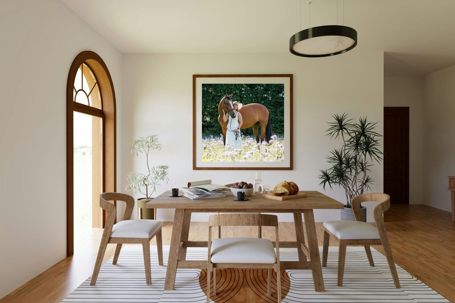 Contemporary living space with mustard yellow couch, black and white art, and modern floor lamp.
