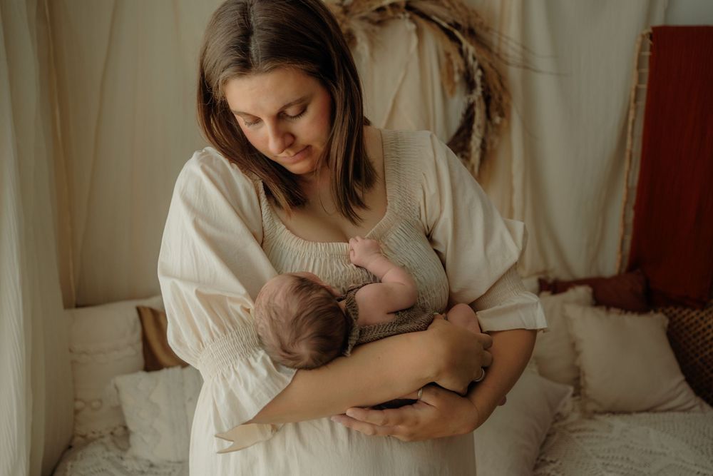 Mother holding newborn baby