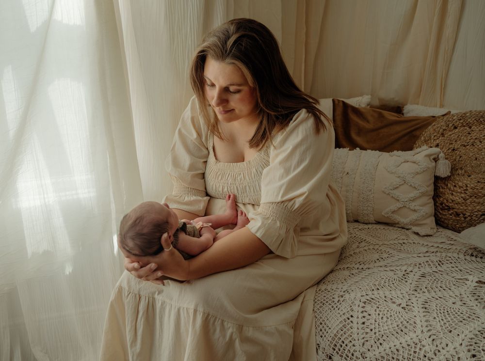 Mother holding newborn baby