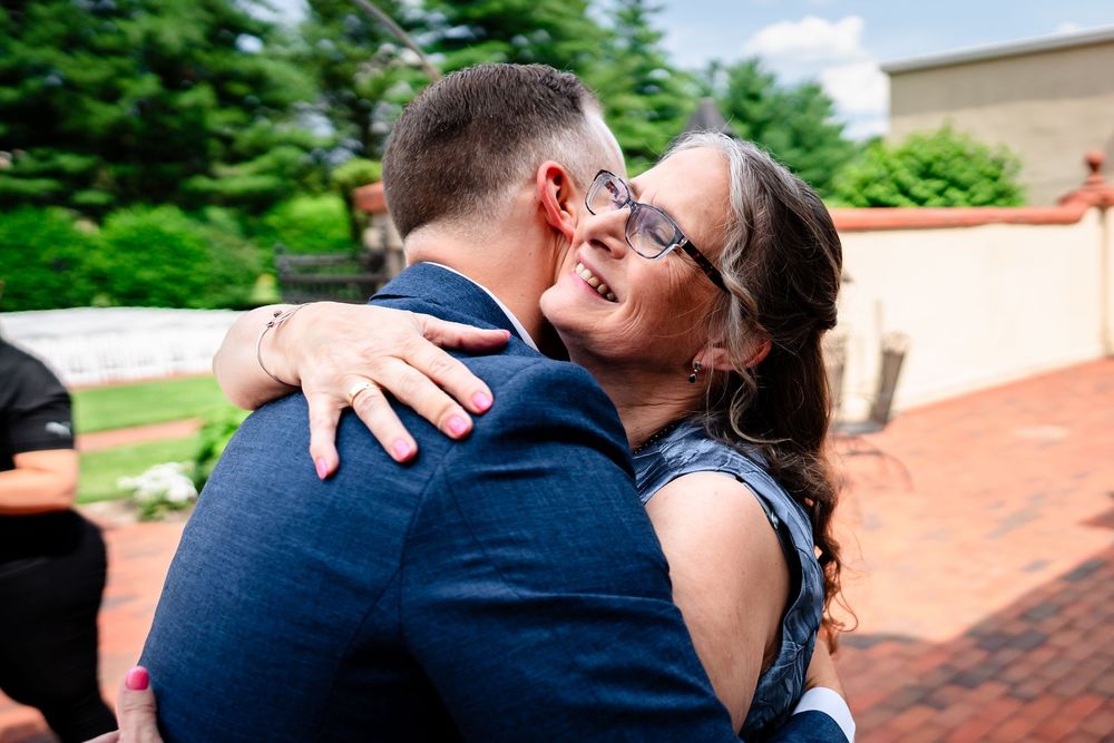 Intimate wedding photography moments captured outdoors on a sunny day.