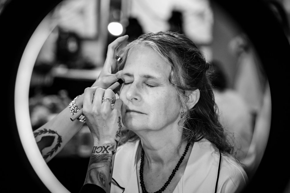 Black and white portrait series showing a person singing with expressive emotion.