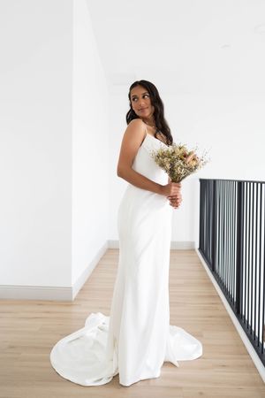 Elegant bridal portrait with dried flower bouquet.