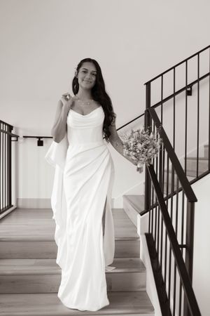 Classic black and white bridal portrait on stairs.