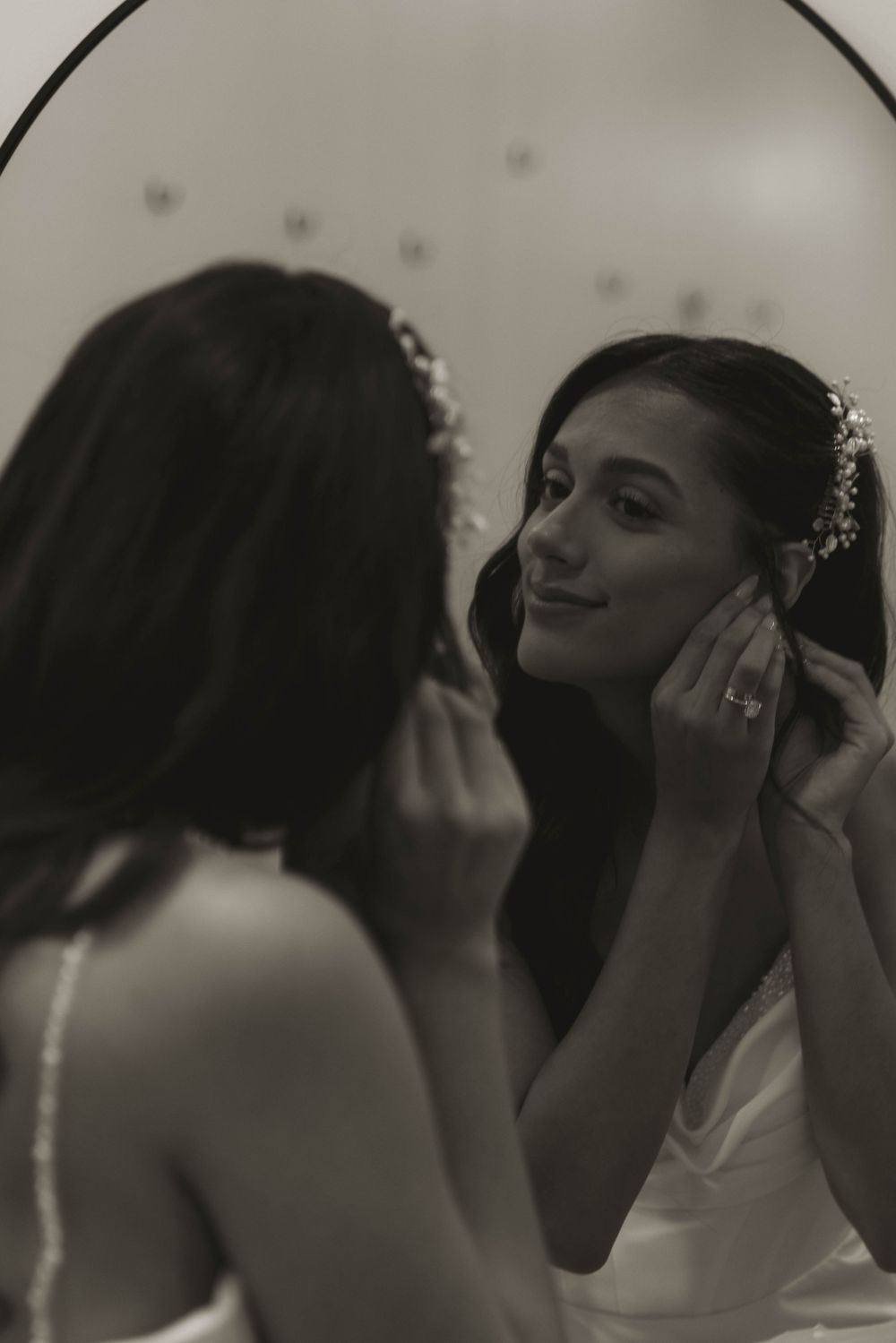 Intimate black and white portrait capturing emotional wedding day moments.