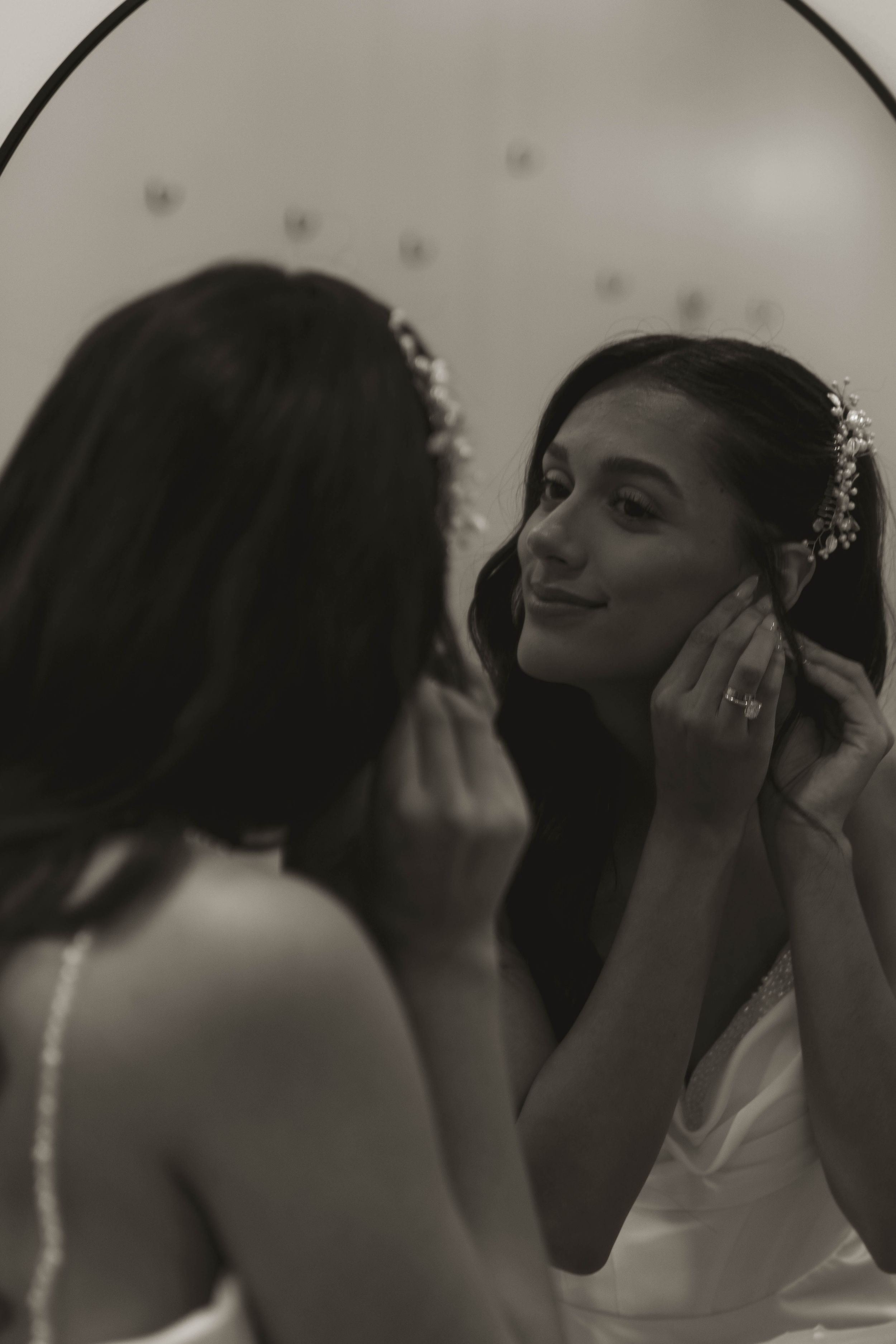 Intimate black and white portrait capturing emotional wedding day moments.