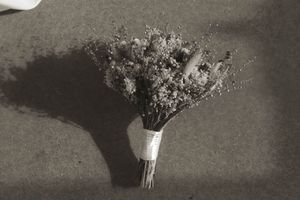 Black and white floral bouquet details captured in an artistic sequence.