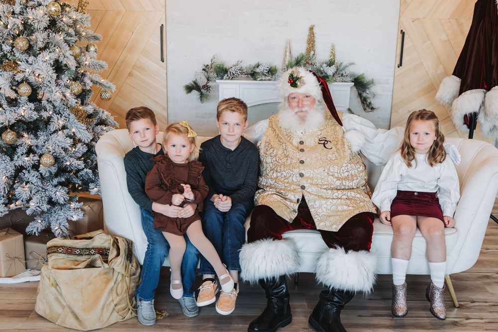 A series of holiday family portraits taken in front of a decorated Christmas tree with white and silver ornaments.