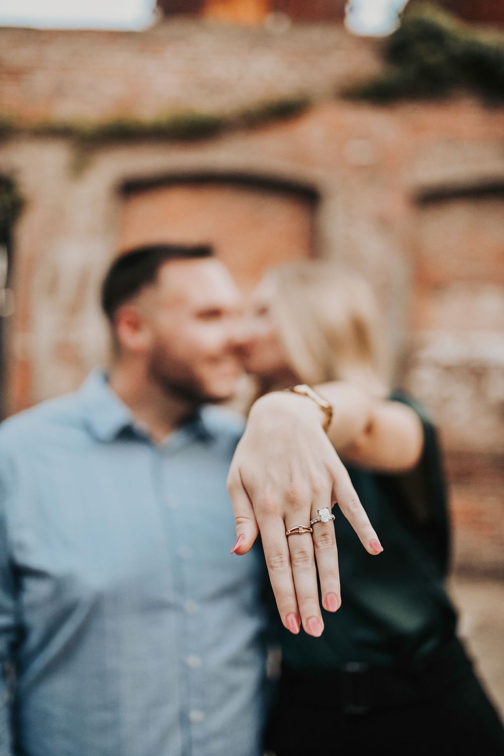 Nicholas proposing to Brooke at sunset at The Cotton Mill in McKinney, Texas