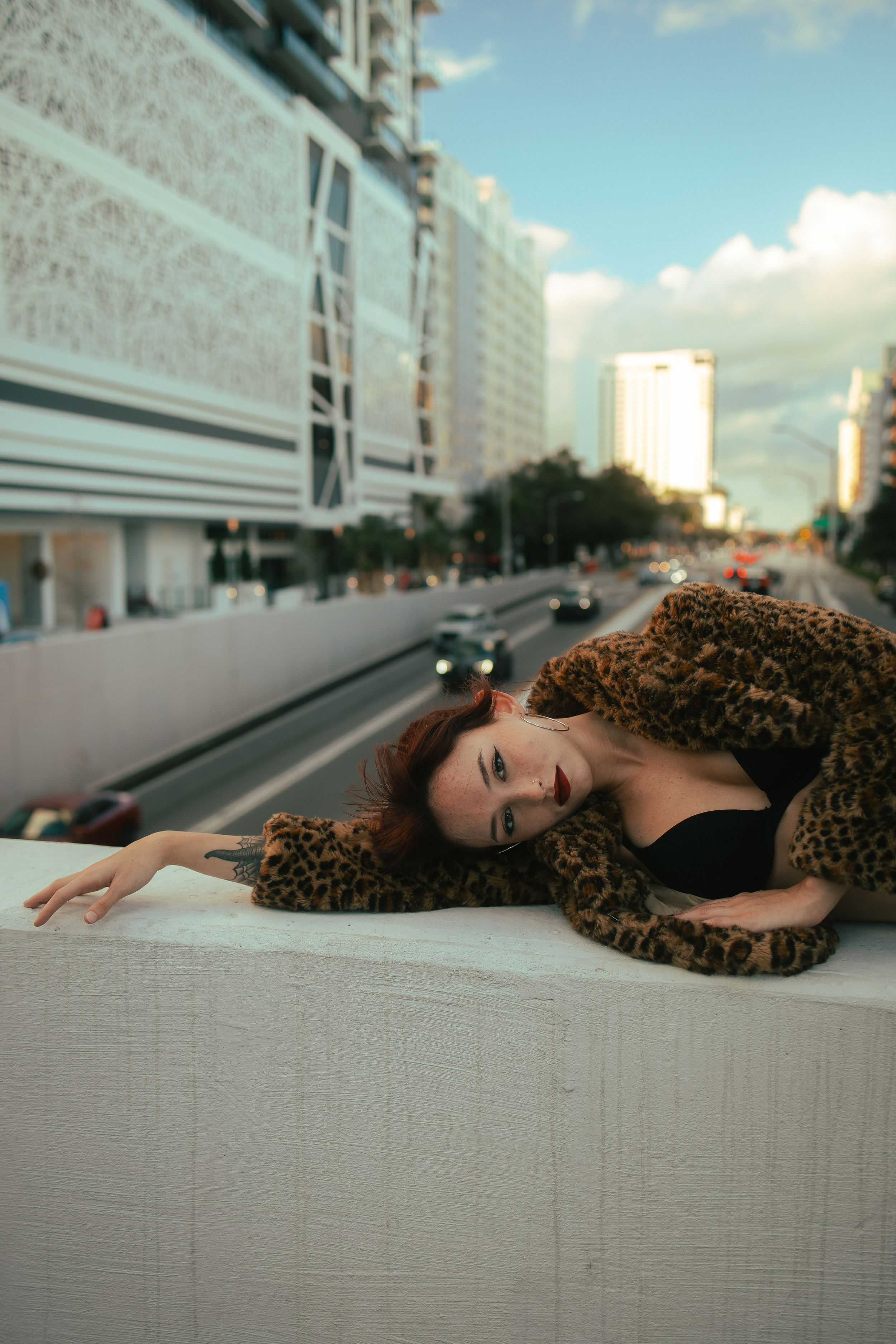 Editorial portrait in downtown Miami, Prada-inspired fashion shoot. Pinterest-ready city vibe by MannyPortraits for Miami Swim Week.