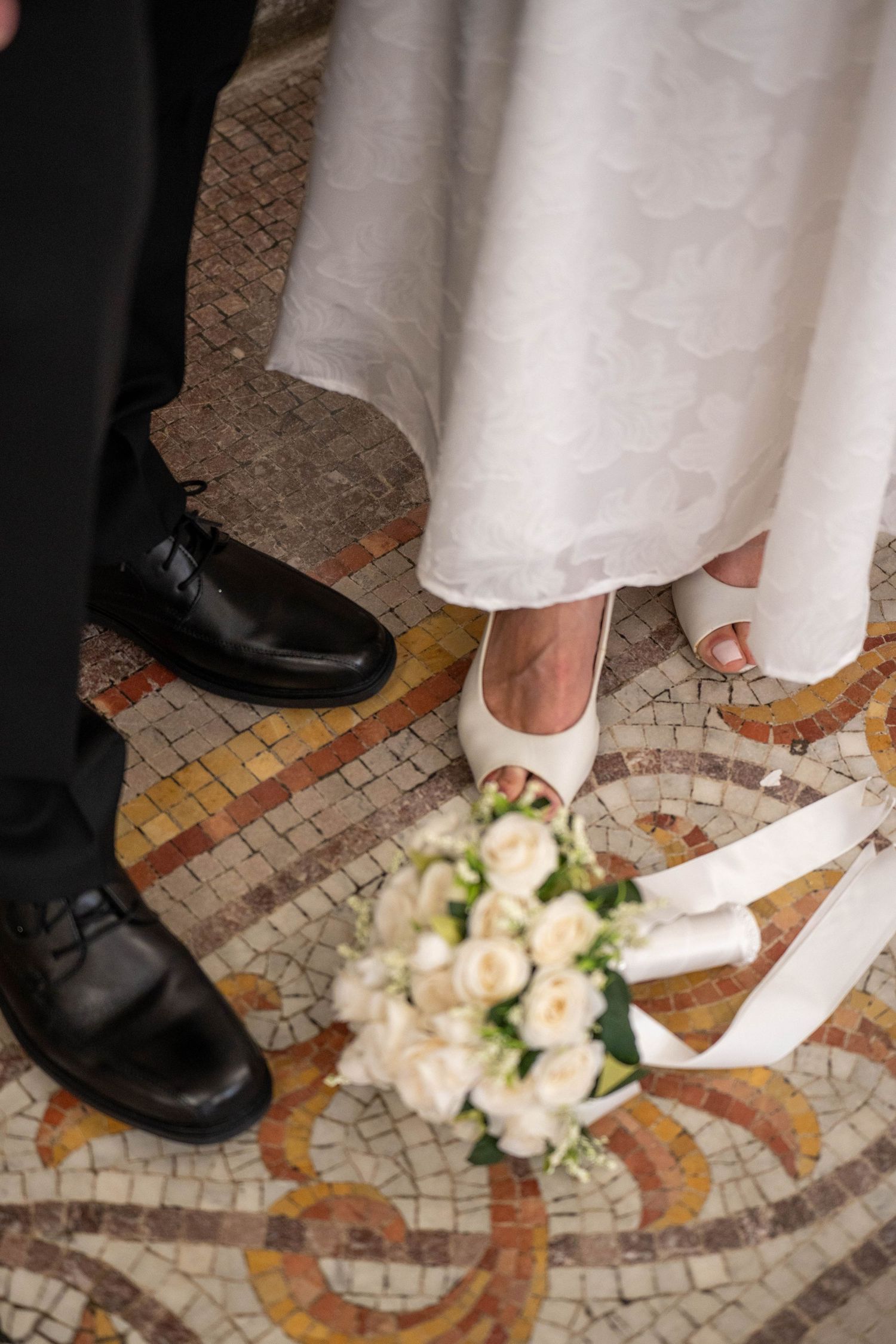Wedding ceremony moments showing couple exchanging vows in elegant indoor setting.