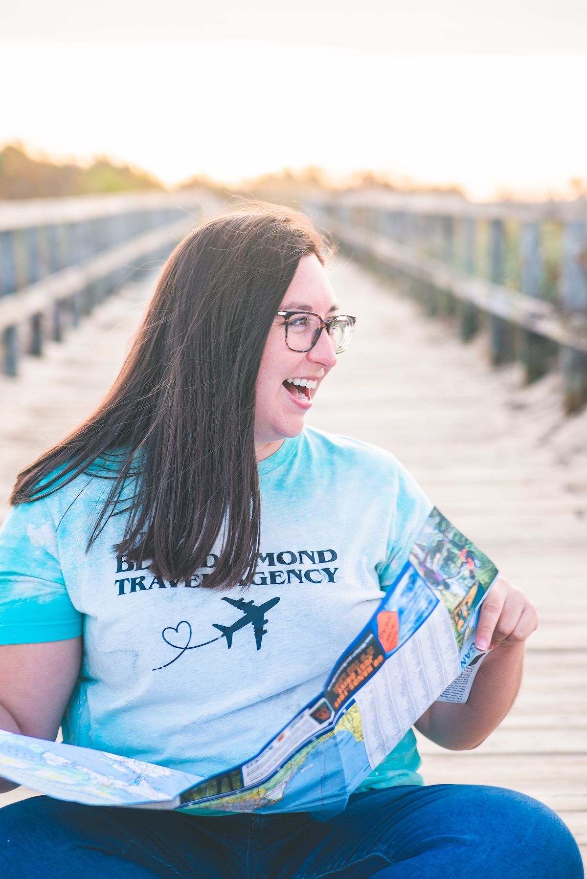 Entrepreneur creating content for her brand, showing versatility of personal brand images.