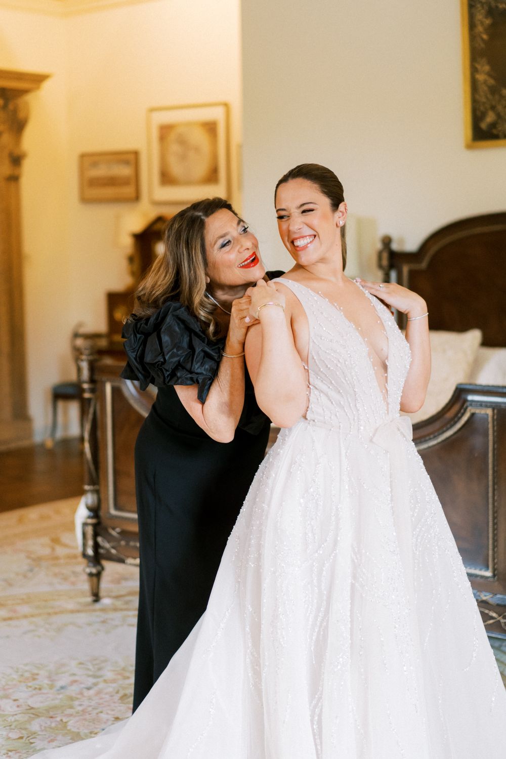 A sequence of photos showing the final touches being made to a wedding dress in an elegant indoor setting.