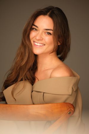 Portrait series showing joyful expressions and natural poses against a warm beige background.