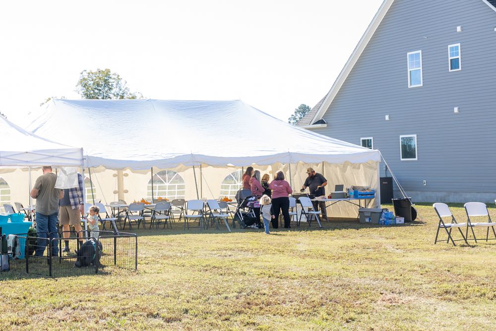 fall festival hosted by swansboro and Emerald Isle real estate agent on the crystal coast. family photography and event photography near me.