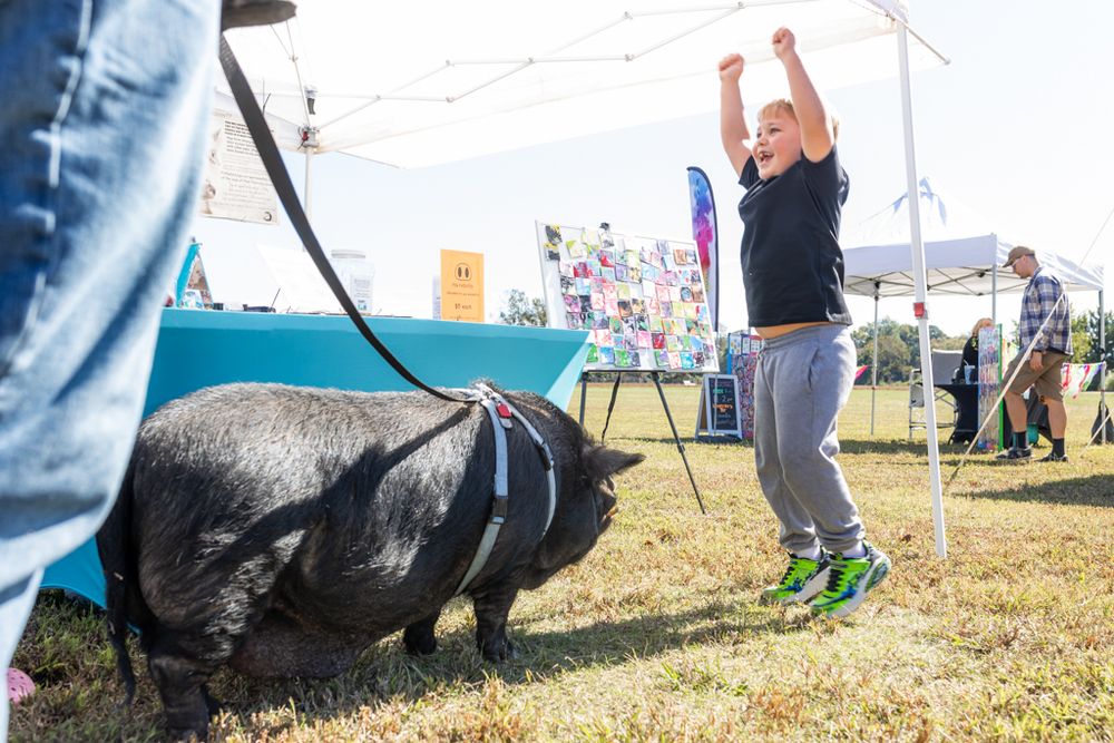 fall festival hosted by swansboro and Emerald Isle real estate agent on the crystal coast. family photography and event photography near me.