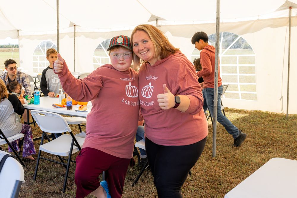 fall festival hosted by swansboro and Emerald Isle real estate agent on the crystal coast. family photography and event photography near me.