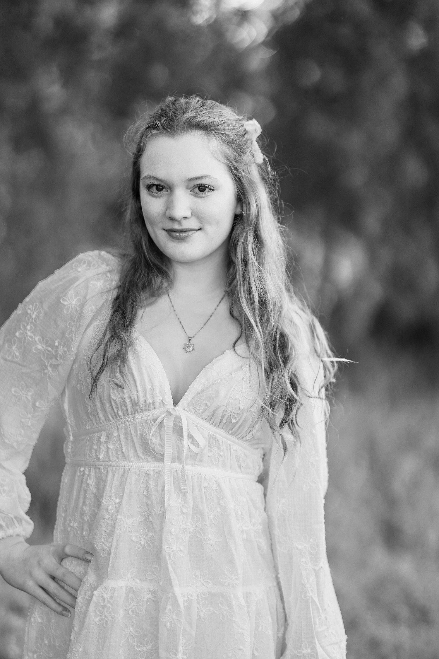 Black and white portrait series showing delicate lace details and natural expressions.