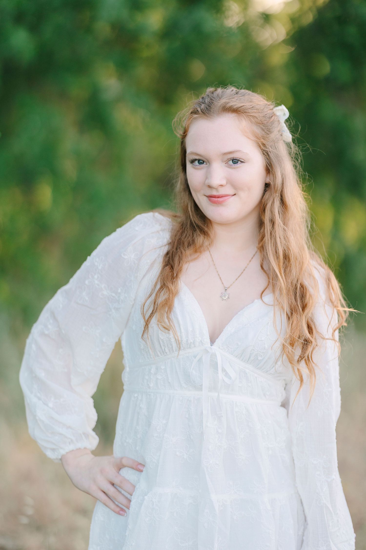 Dreamy outdoor portraits with soft lighting and a vintage-inspired white dress.