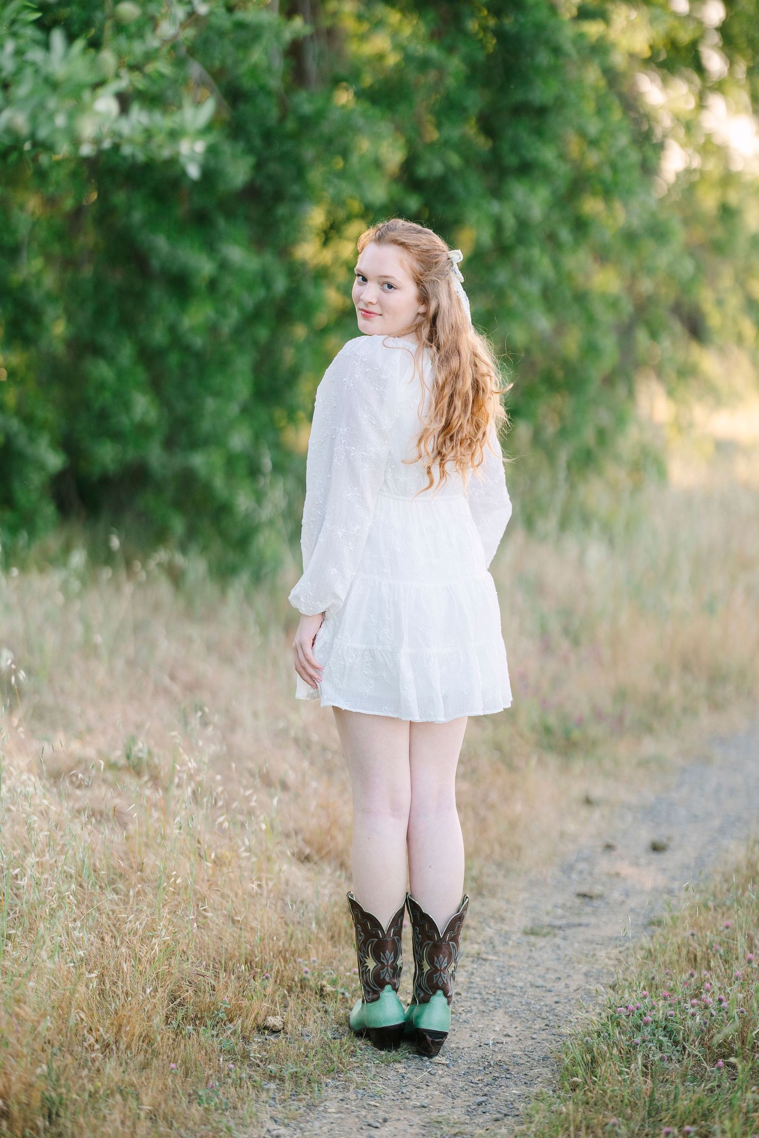 Playful outdoor photo series showing movement and style in a natural setting.