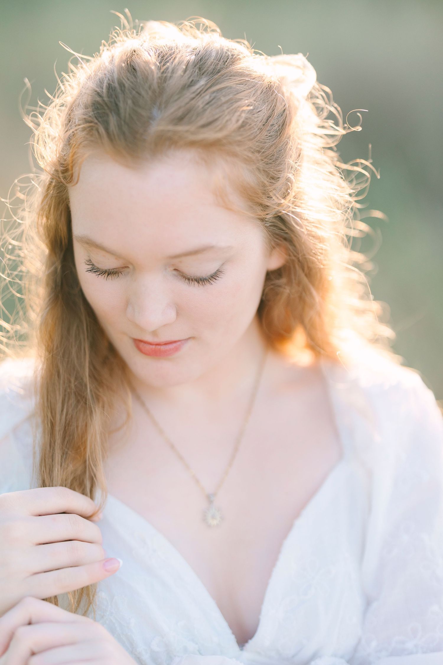 Soft, backlit portraits capturing intimate moments in delicate white lace.
