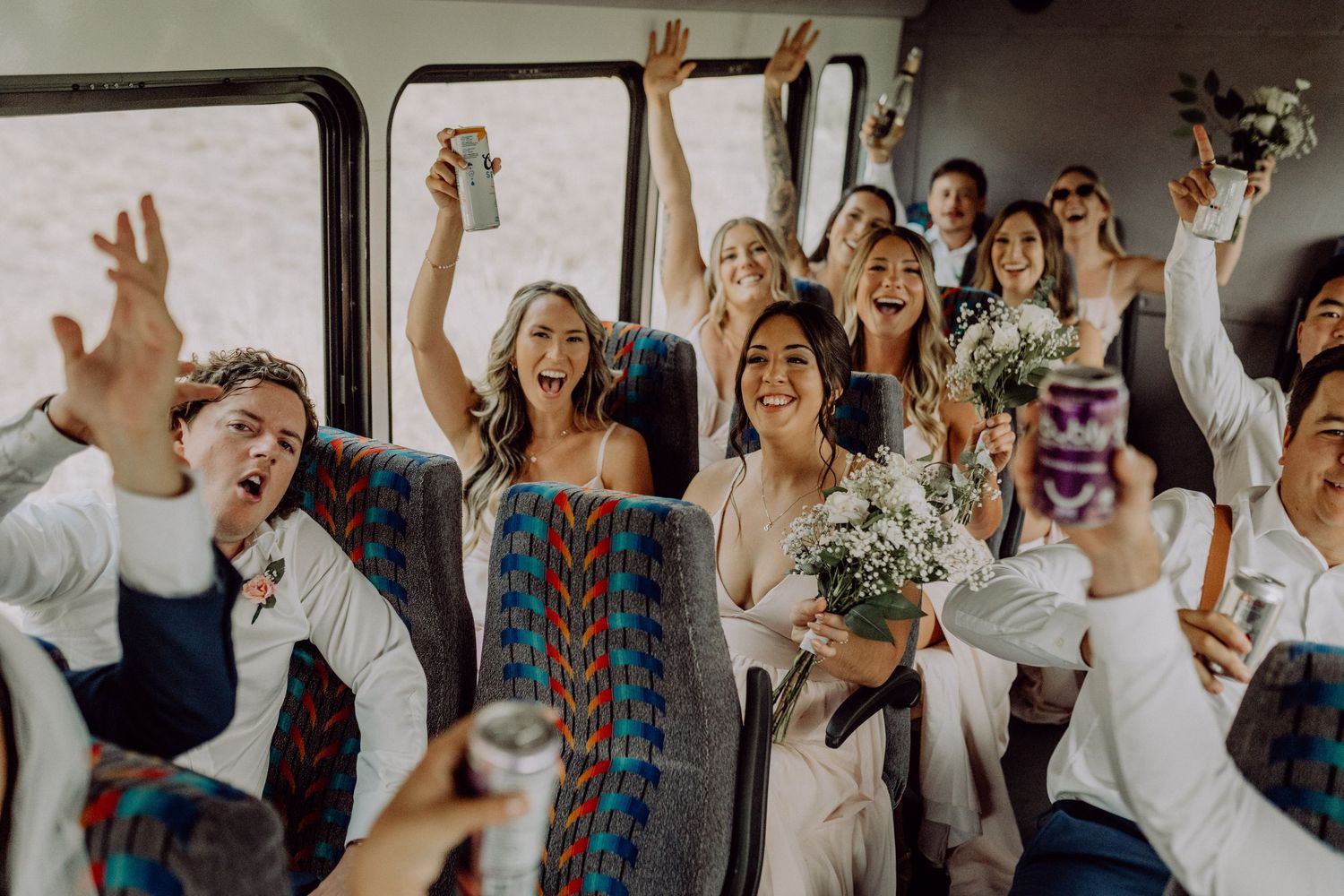 Wedding party celebrates joyfully with raised arms in a candid group photo sequence.