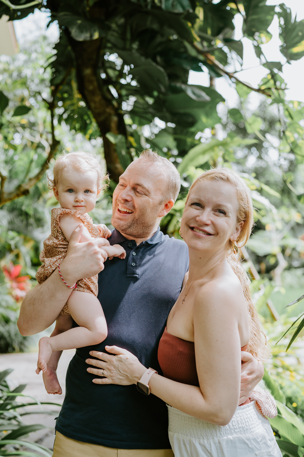 Lifestyle family photoshoot at Adiwana Suweta Bali with lush tropical surroundings.