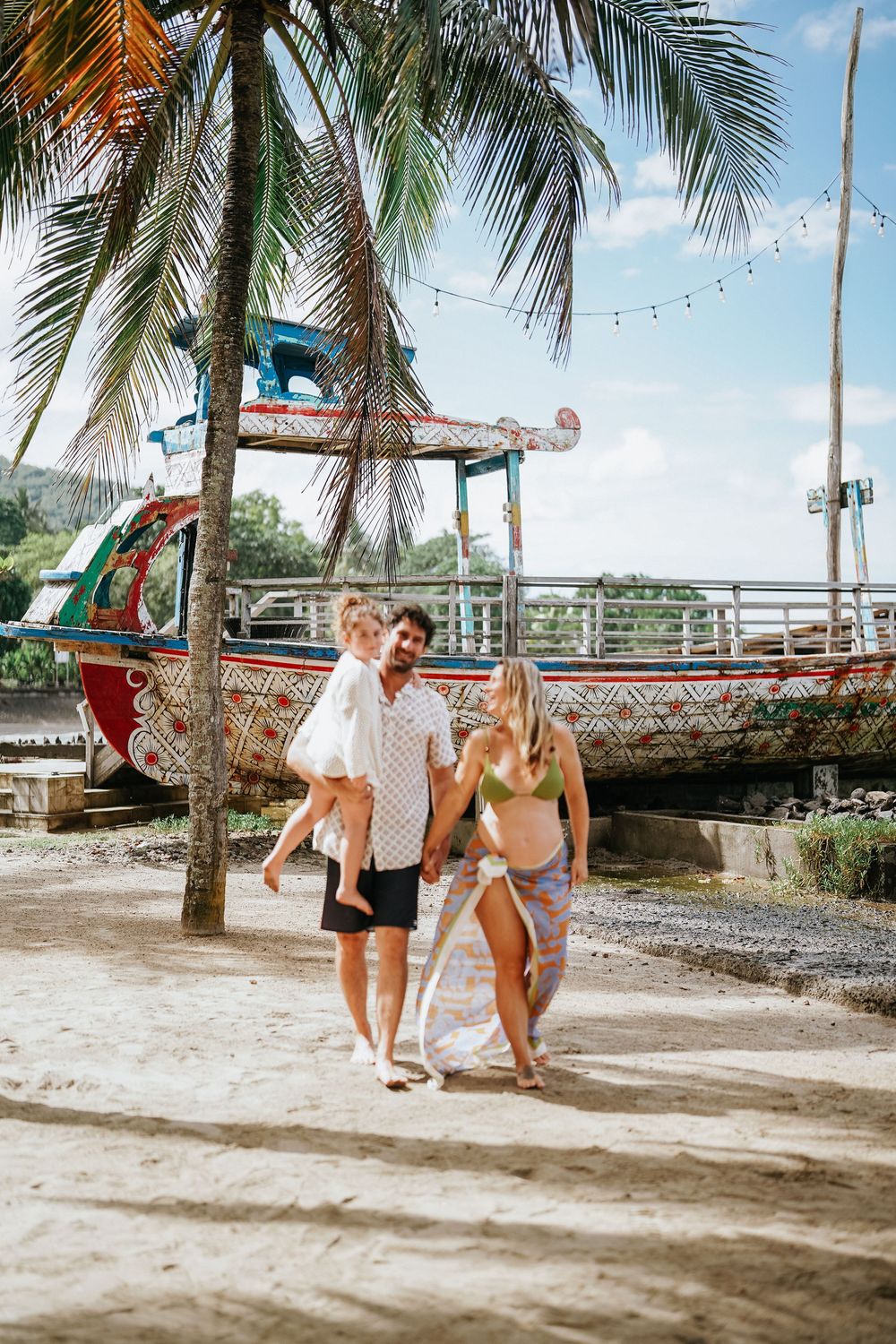 Beach family photography session at Candi Beach Resort Bali