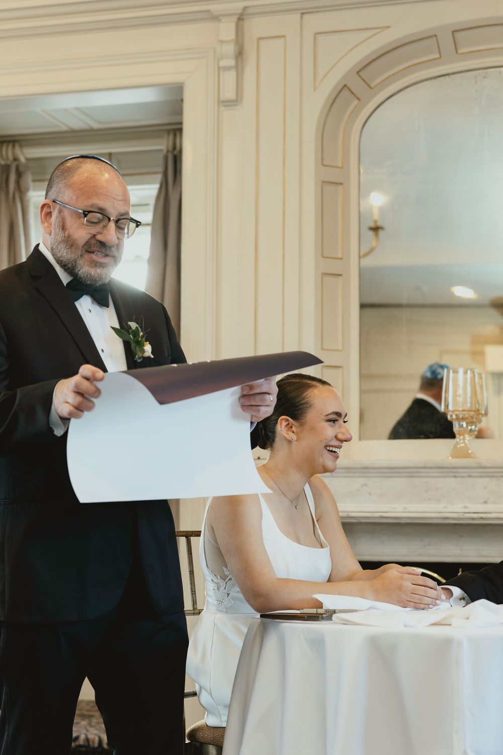 A sequence of photos showing a bride and guest sharing a joyful moment while reading papers at an elegant wedding reception.