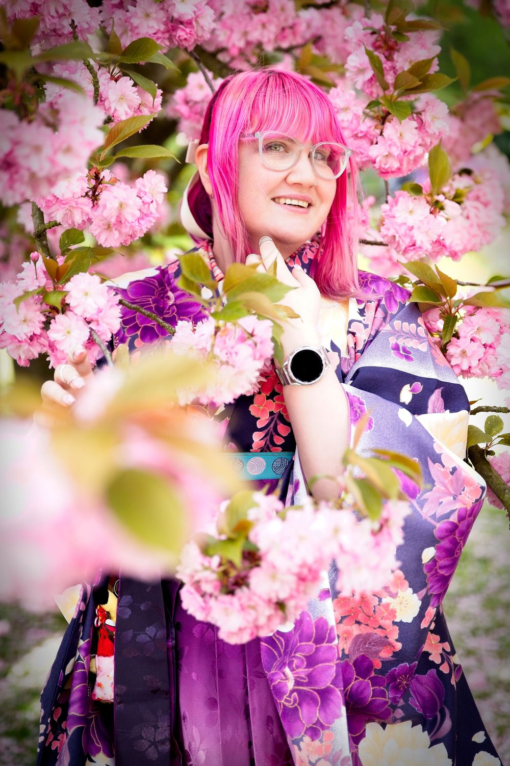 portrait of a person in cherryblossom in traditional kyoto