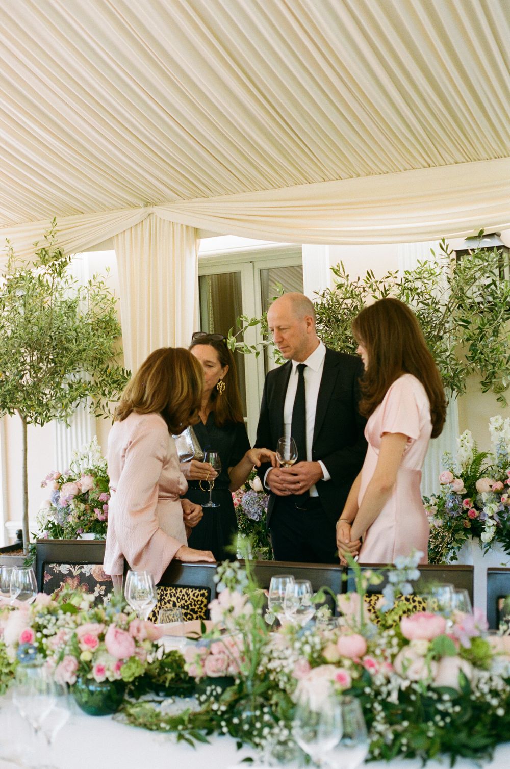 Paris wedding with family on balcony, paris laurent restaurant, paris wedding reception, paris wedding shot on film, weddings on film