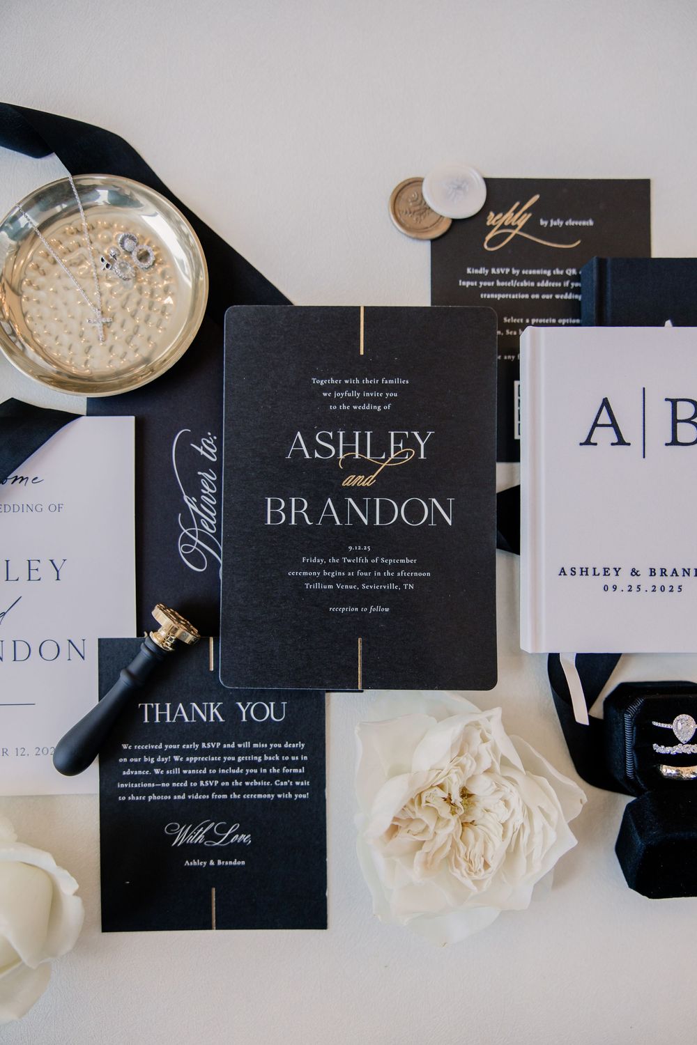 Elegant black and gold wedding stationery suite featuring invitations, thank you cards, and monogram details for Ashley and Brandon.