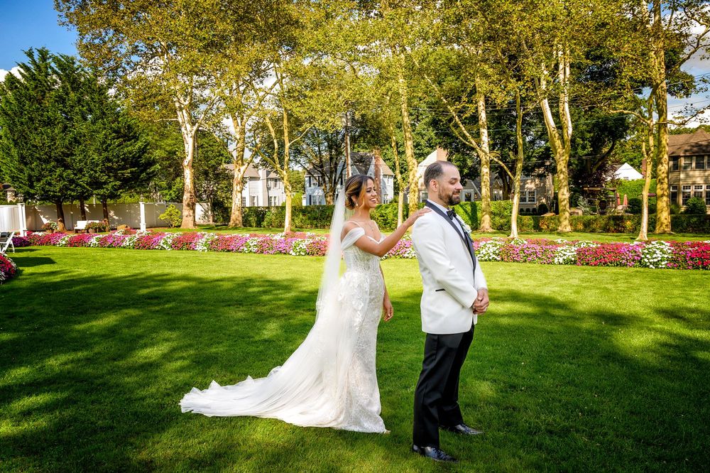 Romantic fridt look with bride and groom portrait at Stewart Manor Country Club in Long Island NY