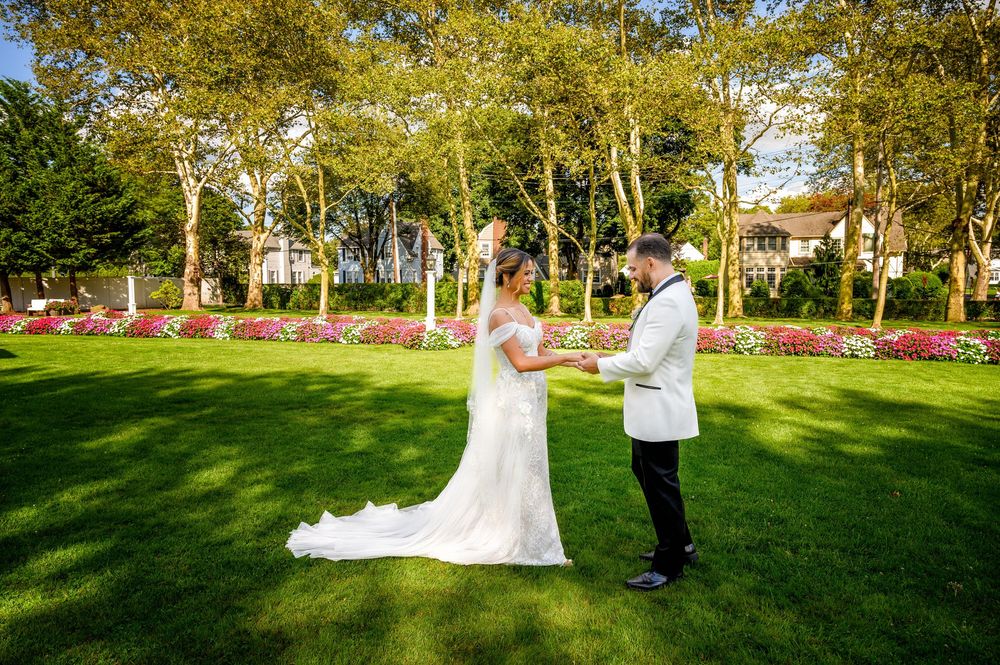 Romantic fridt look with bride and groom portrait at Stewart Manor Country Club in Long Island NY
