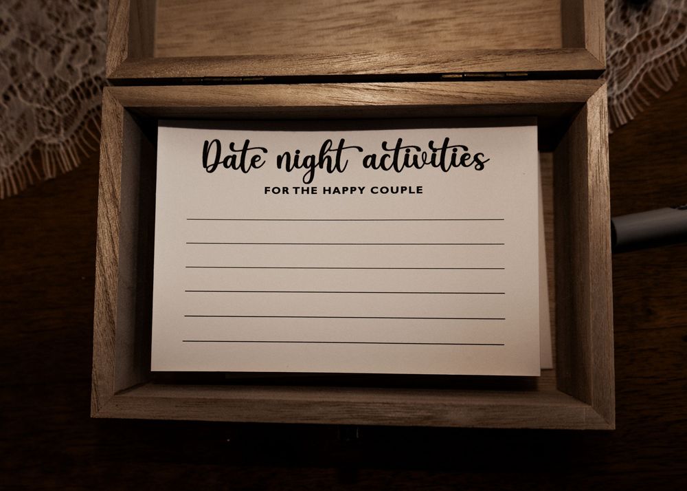 A collection of wooden framed signs with handwritten text and blank spaces arranged in a row.