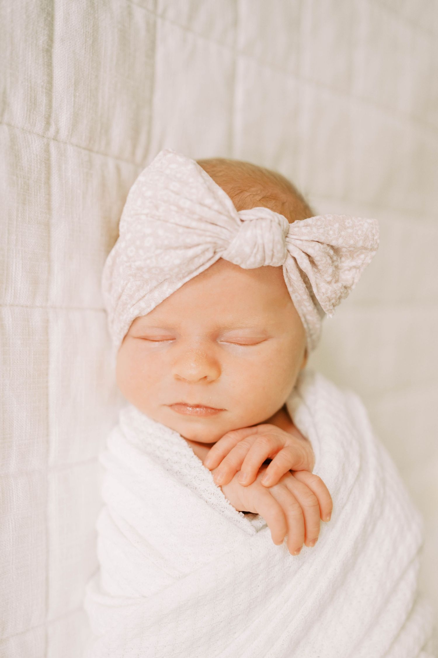 Newborn portraits during lifestyle session is Frisco, TX