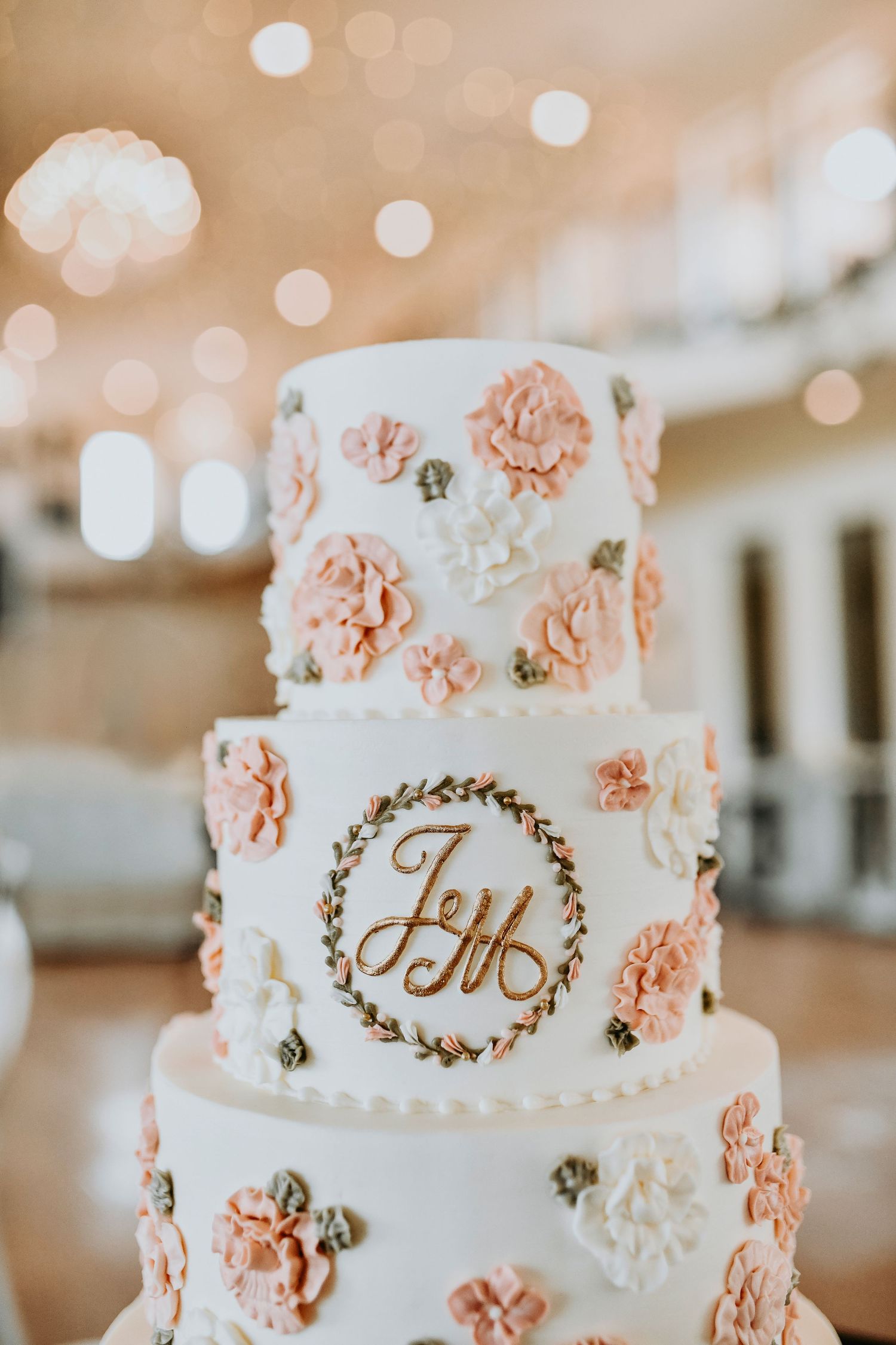 Elegant reception tablescape of the wedding cake at D’Vine Grace Vineyard