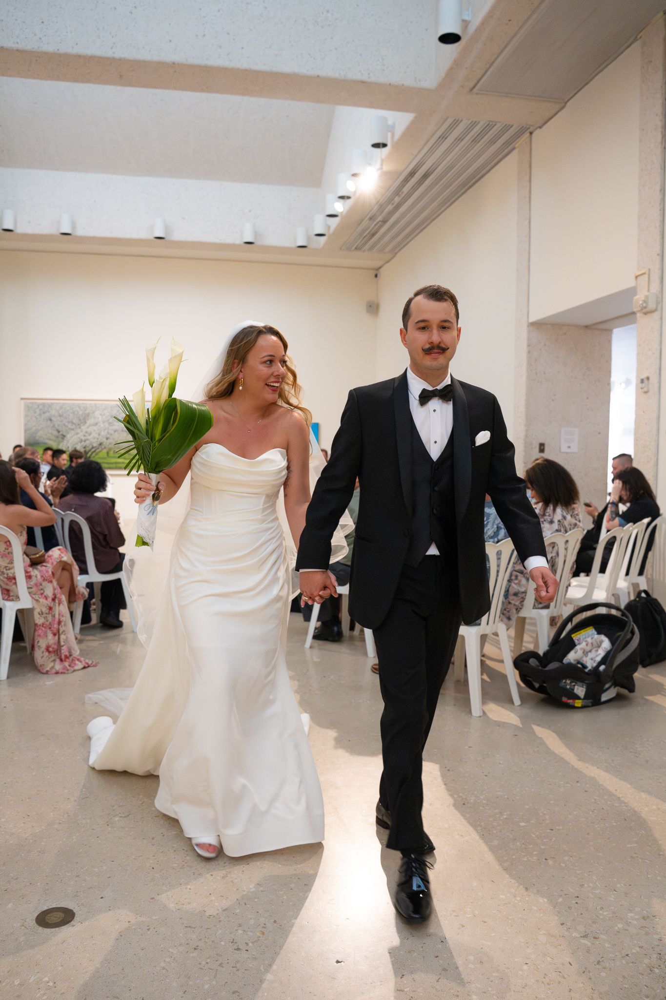 A newly married couple celebrating together just after their wedding ceremony in Corpus Christi, Texas.